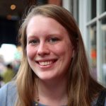 A woman smiling at the camera