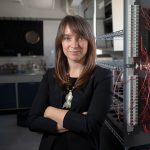 Thea Whitman posing in a lab