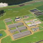 A birds eye view of a dairy farm and all of the buildings on the property. Each aspect of the map is labeled.