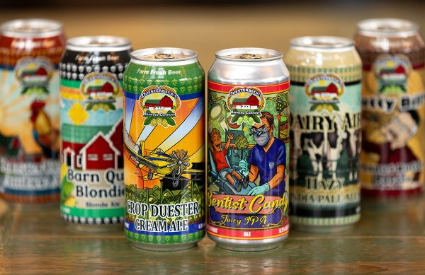 Six different cans of beer, showing each variety. 